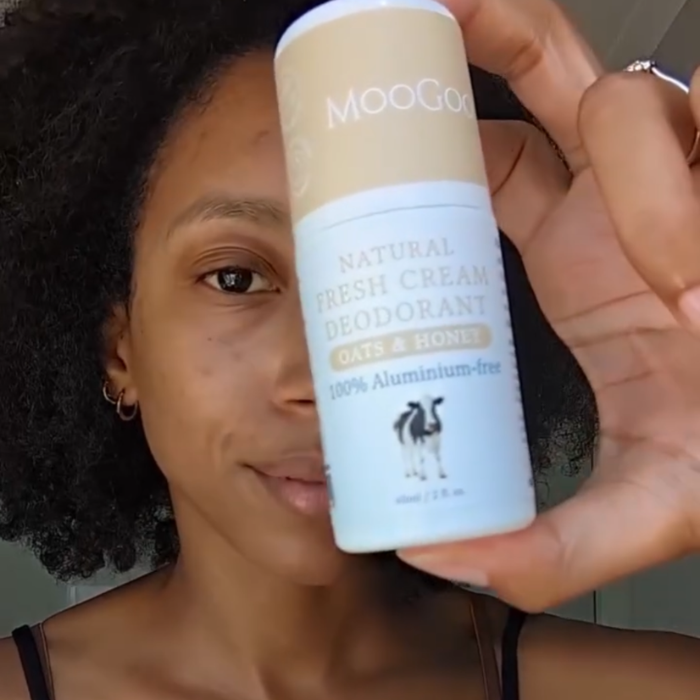 woman holding MooGoo Fresh Cream Deodorant Oats and Honey, natural aluminium free roll-on with sweet fragrance for gentle daily odour control