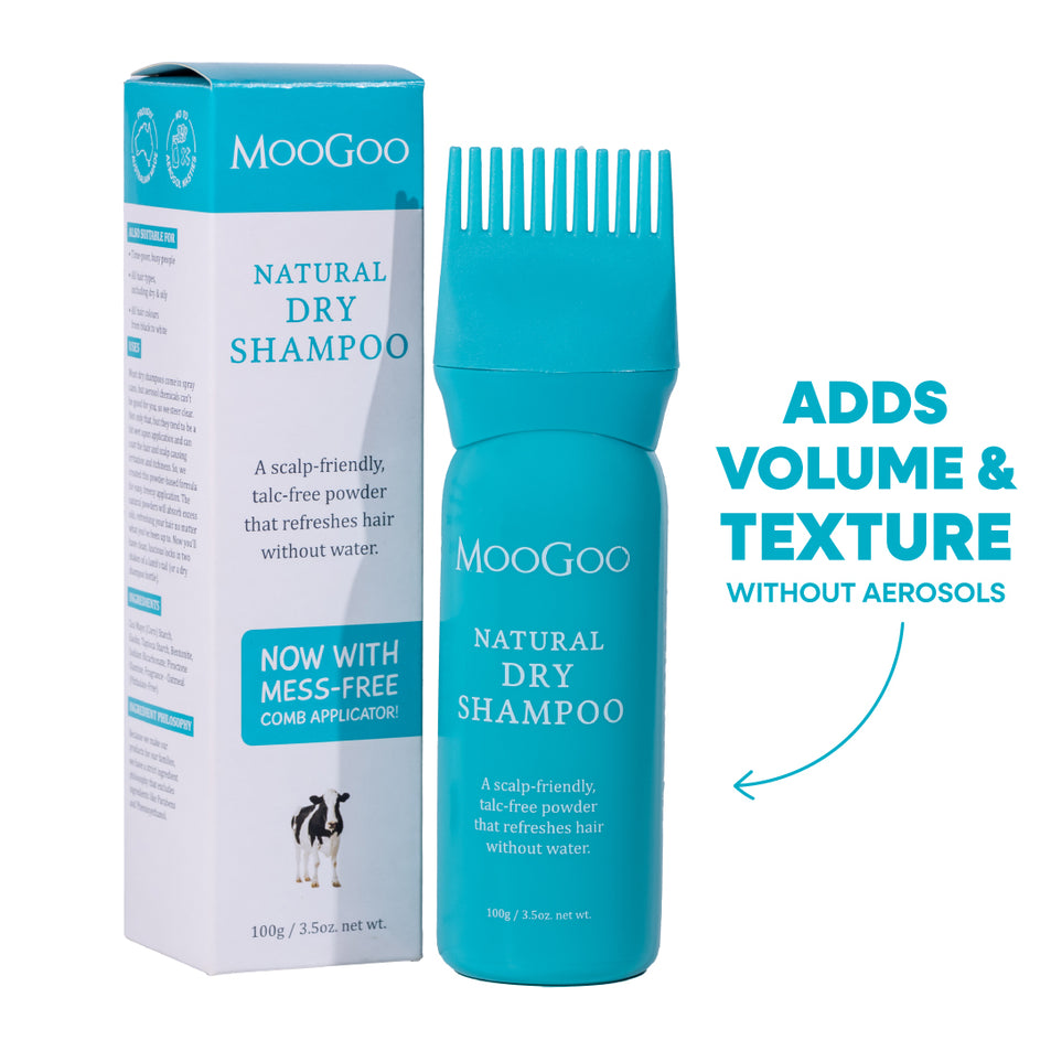 MooGoo natural dry shampoo with packaging and comb applicator on a white background