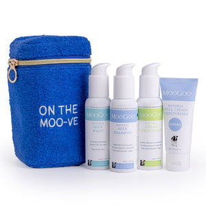 MooGoo Travel Pack on white background, including blue terry towelling bag, travel-sized Milk Shampoo, Cream Conditioner, Milk Wash and Full Cream Moisturiser - ideal for sensitive skin, hydration and scalp health